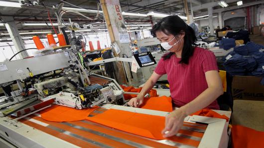 100701629 woman working in clothing factory getyp.530x298 — image courtesy of cnbc.ocm