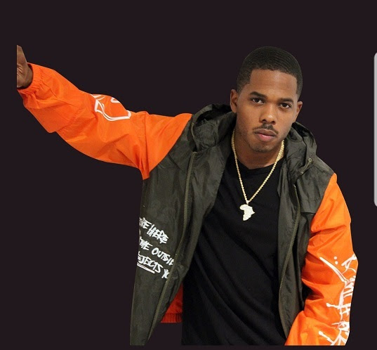 J. Brown orange jacket