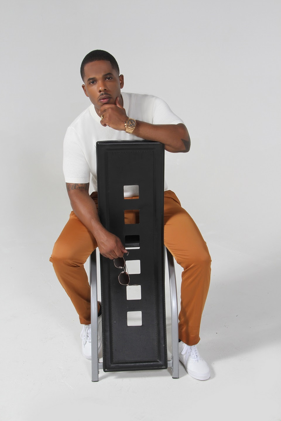 J Brown sitting
