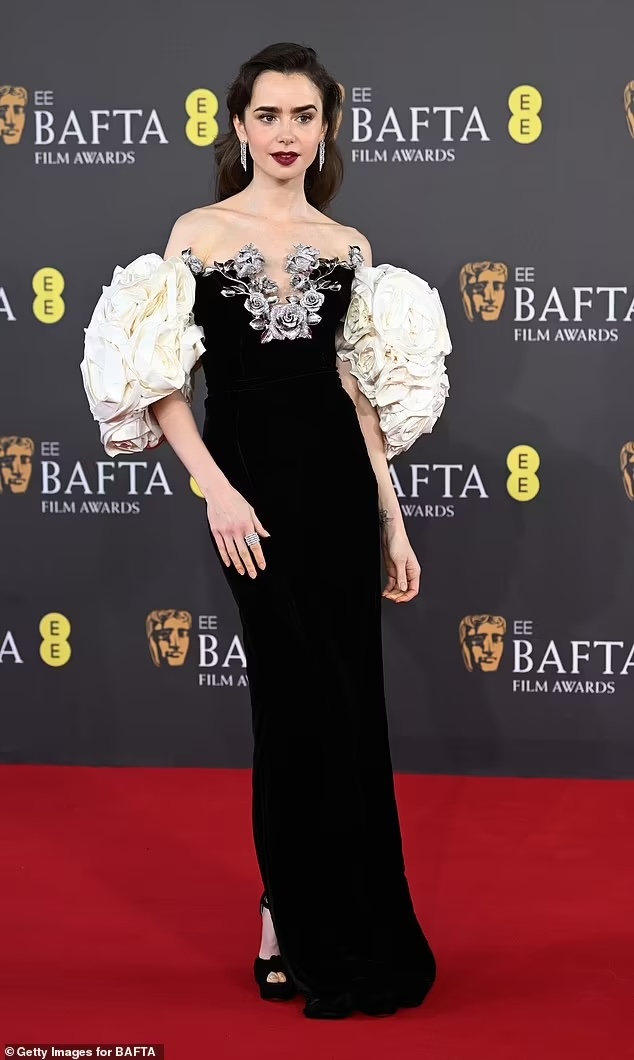 lilly colins — image courtesy of Jason Howard / Bauer-Griffin / GC Images / Getty Images
