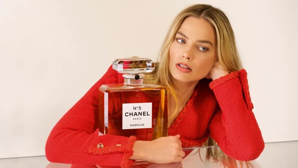 Margot Robbie chanel WWD — image courtesy of wwd.com