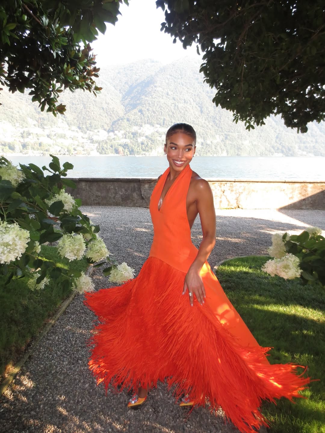 Celebrity Fashion Sightings Lori Harvey Wore Bottega Veneta Vacationing In Lake Como redcarpetfashionawards — image courtesy of red-carpetfashionawards.com